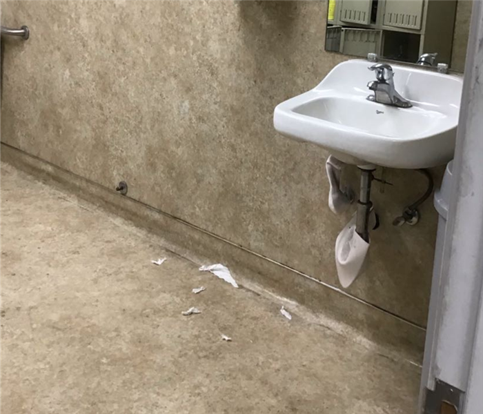 rain Storm damage in commercial bathroom